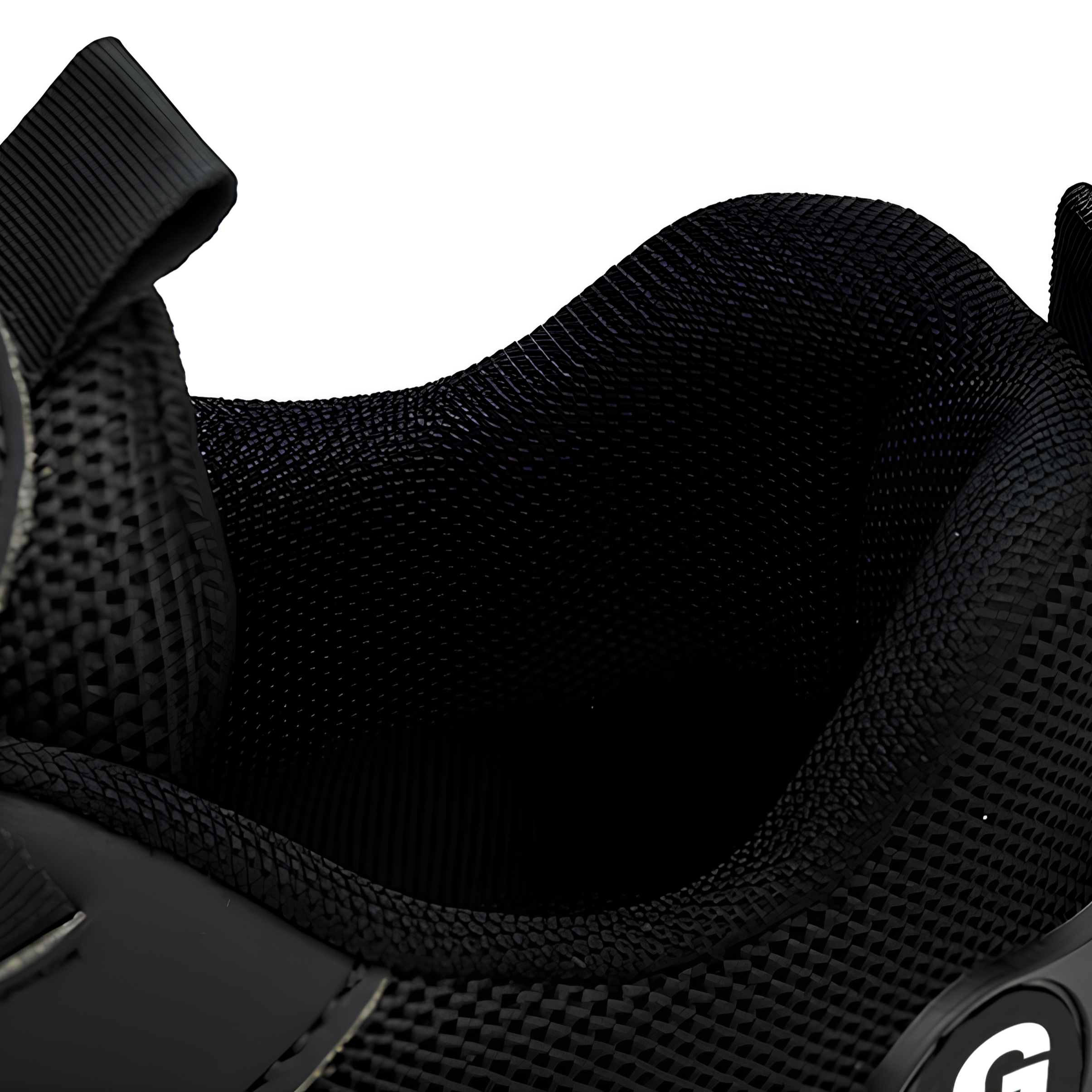 Close-up of a black shoe with textured sole and visible brand logo on a white background